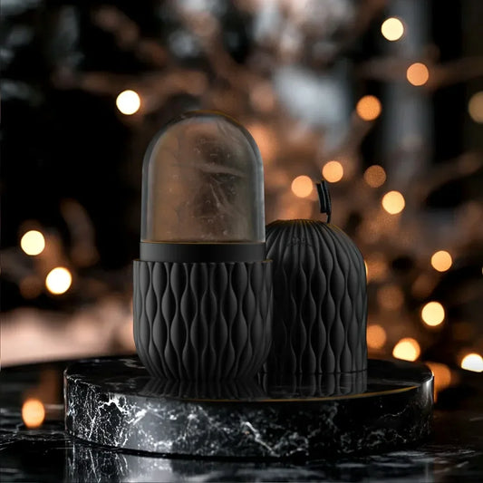silicone ice face roller tool on marble background